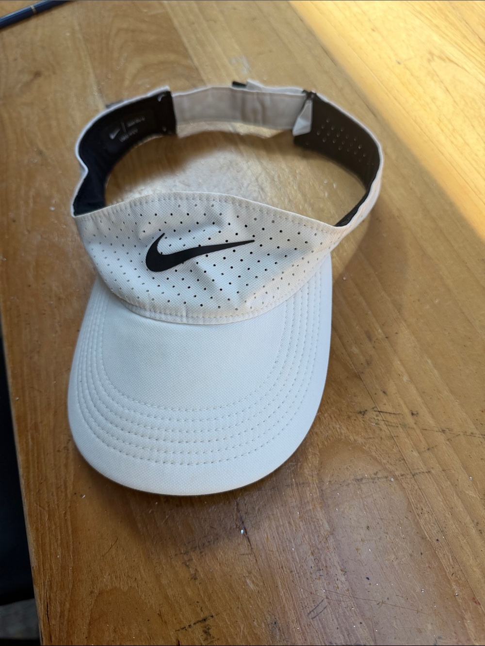 Nike White Visor with Black Swoosh Logo